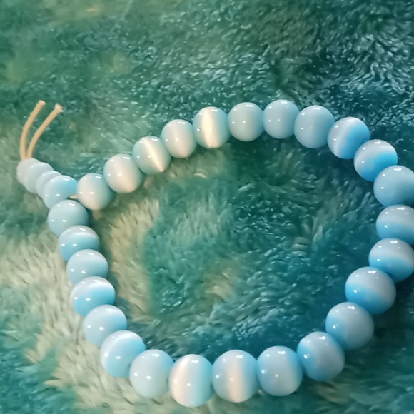 4 beaded cats eye quartz like bracelets 4 different colors. Adjustable - Picture 6 of 6